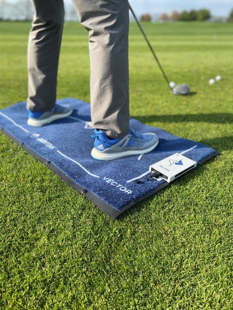 BodiTrak pressure mat during a golf swing